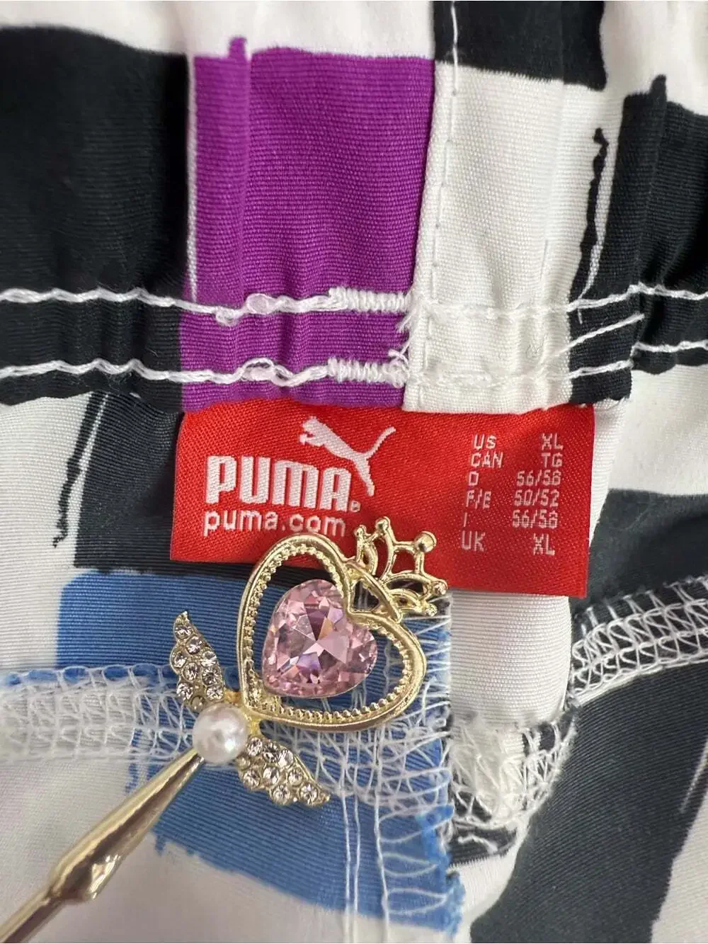 Puma shorts White Swim Board Shorts with Black, Blue, and Purple Geometric Print